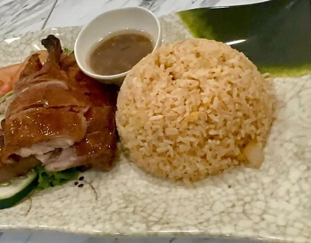 51. Roasted Duck on Red Rice (1/4 Duck).